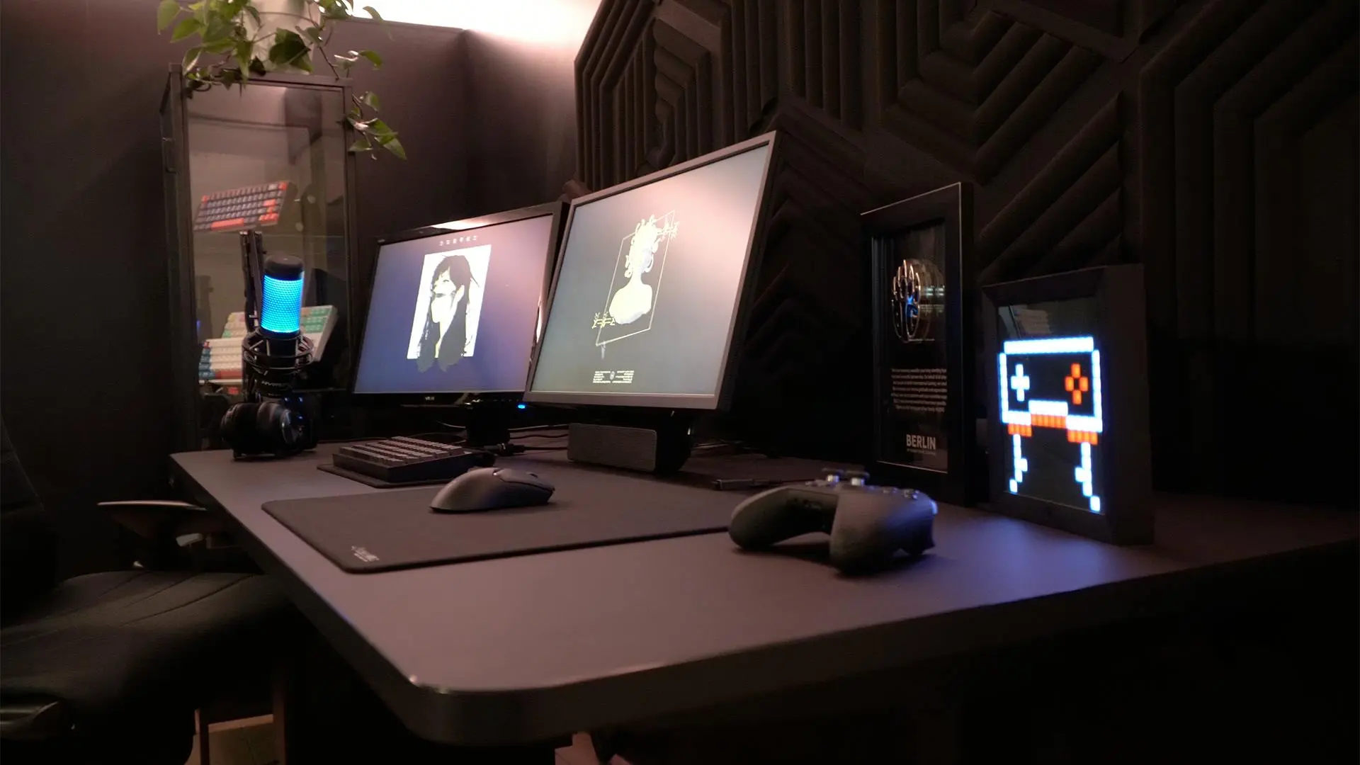 Clean gaming desk setup with monitors and RGB lighting